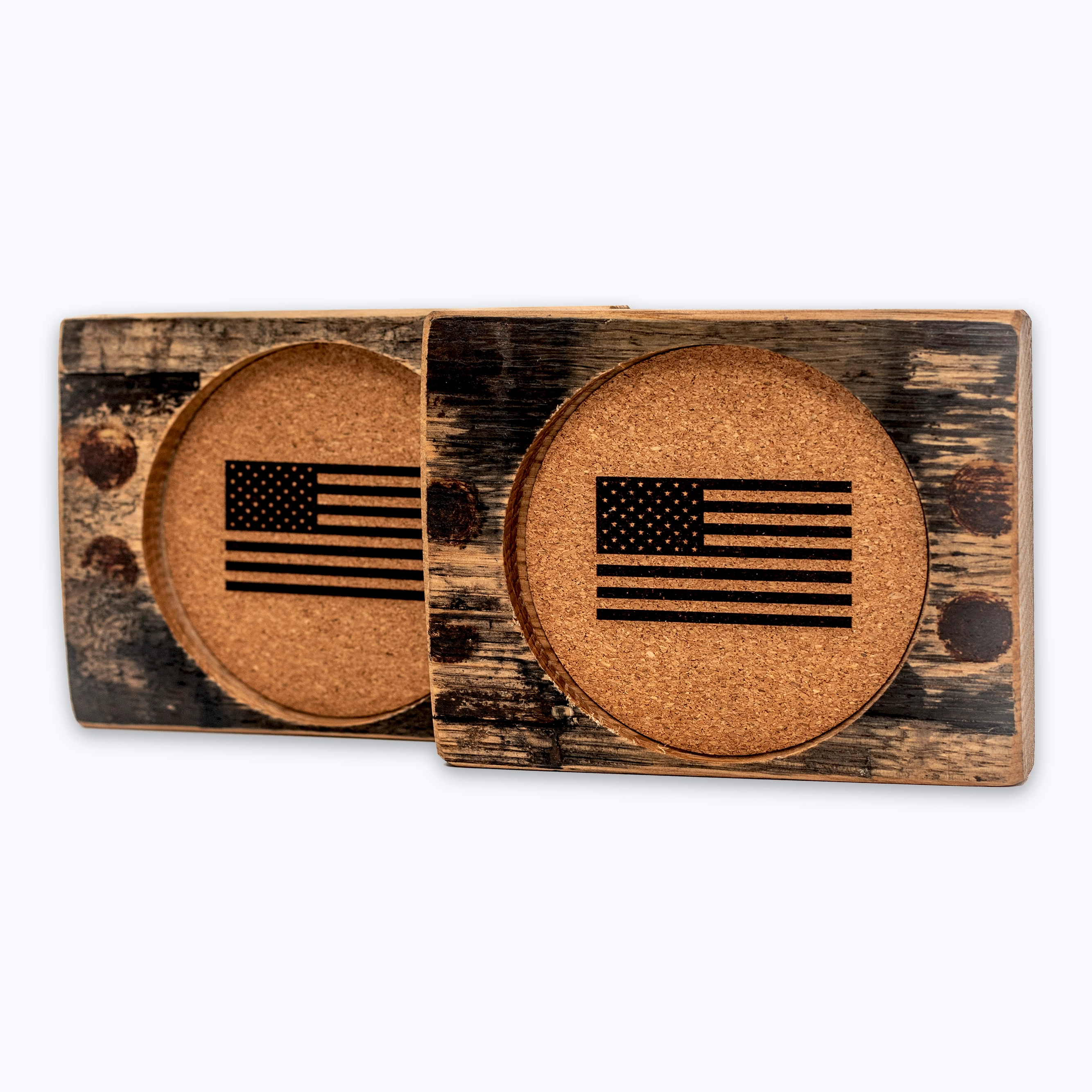 Two Flags of Valor bourbon barrel wooden coasters with an American flag design