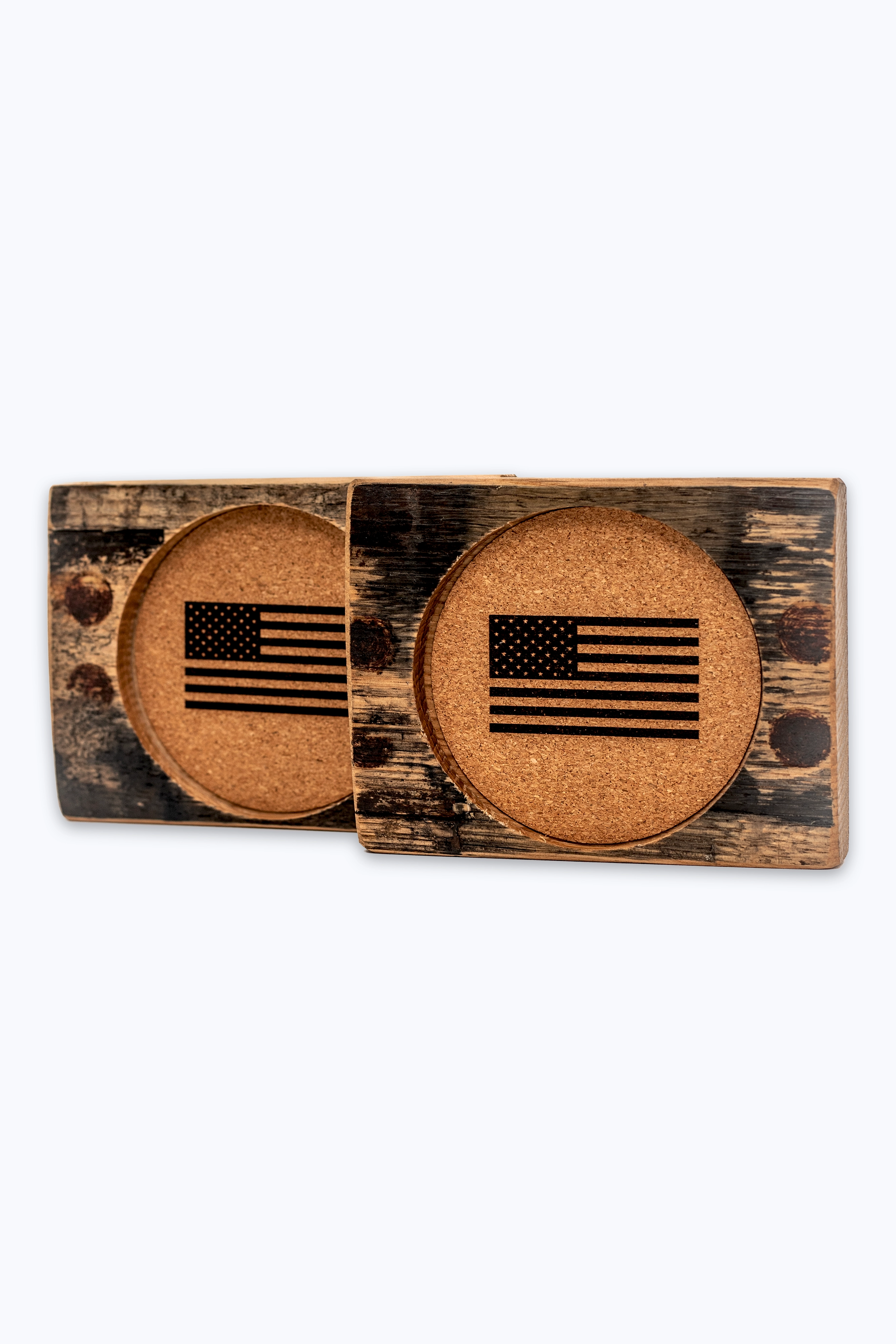 Two Flags of Valor bourbon barrel wooden coasters with an American flag design