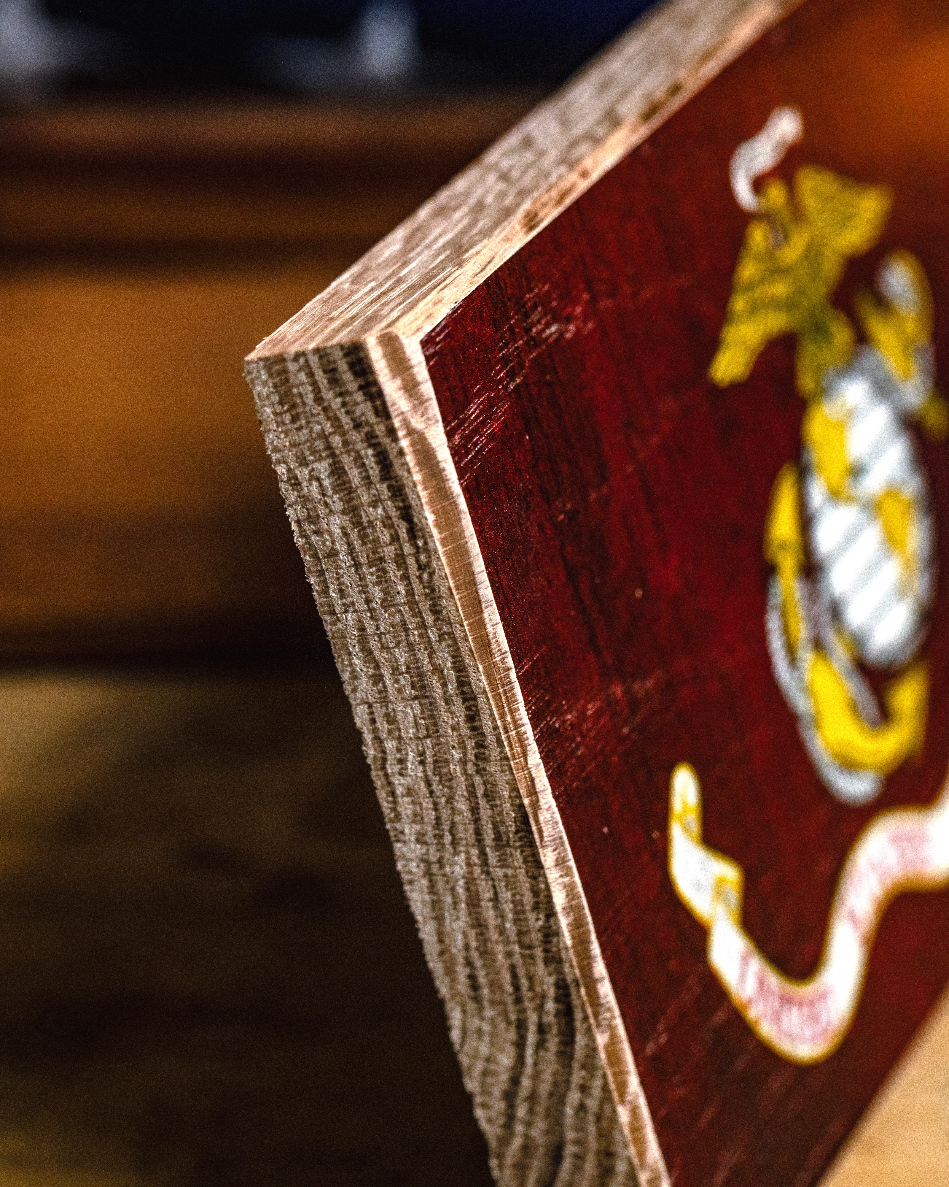 Service Branch Desk Flag showing close-up of Marine Corps wooden frame corner.