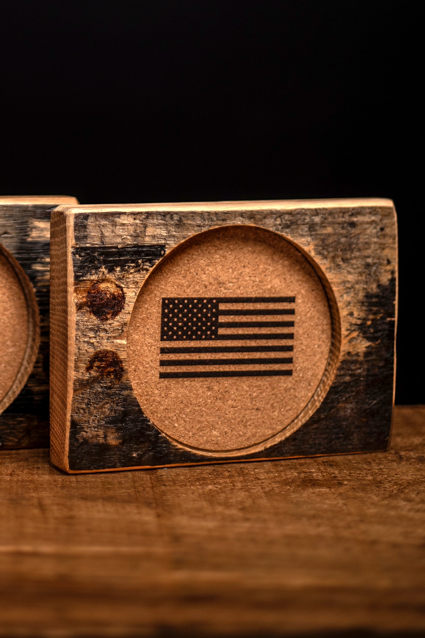Wooden bourbon barrel coaster with American flag engraving