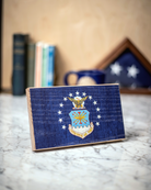 Service Branch Desk Flag featuring United States Air Force emblem with books and a mug in the background.
