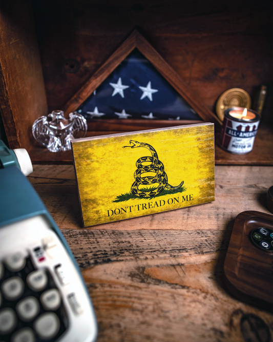 Service Branch Desk Flag featuring Gadsden insignia with a flag in the background.