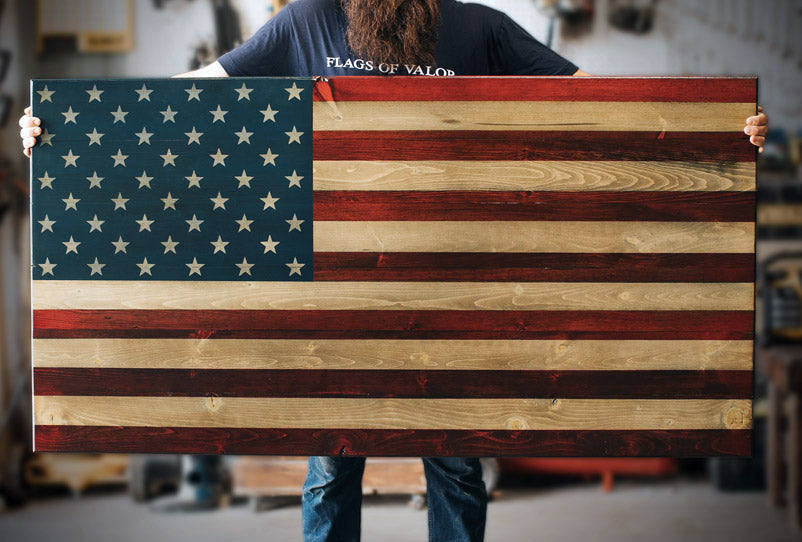 First Responder (XL) Wooden American Flag being held by a Combat Veteran