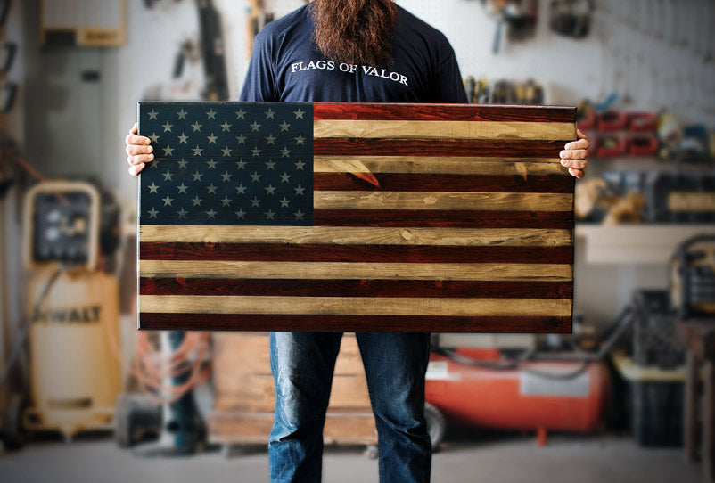 Welcome Home (M) Wooden American Flag being held by a Combat Veteran